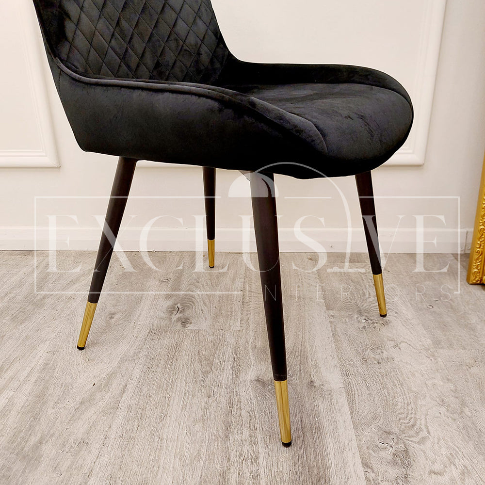 Beautiful Luna Velvet Dining Chair Scandinavian style cross stitch back detail gold tipped black legs. Comfortable luxury chairs, opulent dining chairs styles in black