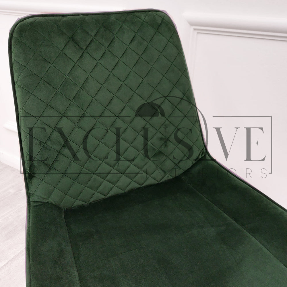 Beautiful Luna Velvet Dining Chair Scandinavian style cross stitch back detail gold tipped black legs. Comfortable luxury chairs, opulent dining chairs styles in green