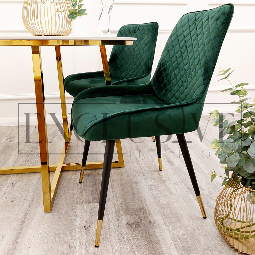 Beautiful Luna Velvet Dining Chair Scandinavian style cross stitch back detail gold tipped black legs. Comfortable luxury chairs, opulent dining chairs styles in green