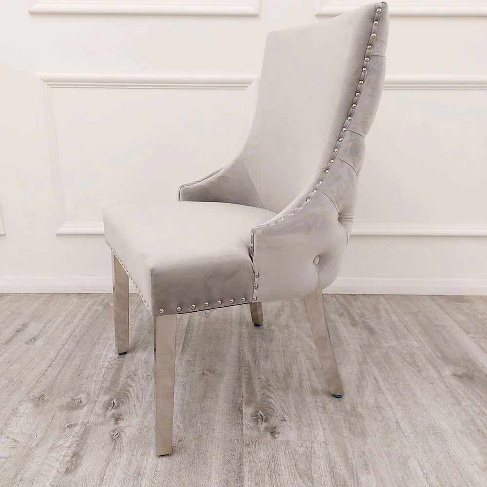 Kensington Velvet Dining Chairs features chrome stud detailing, signature chrome legs, super luxurious deep buttoned back luxury chairs, glam furnishings