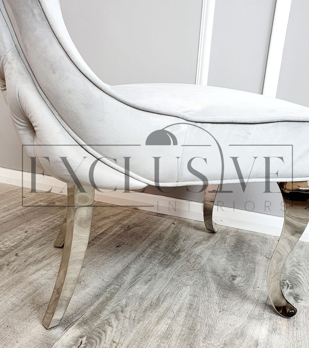 Sandhurst dining chair, deep buttoned back, smooth velvet finish, chrome legs, chic, comfortable chairs, opulent chair style, luxurious easy clean fabrics impressive dining chairs in light cream