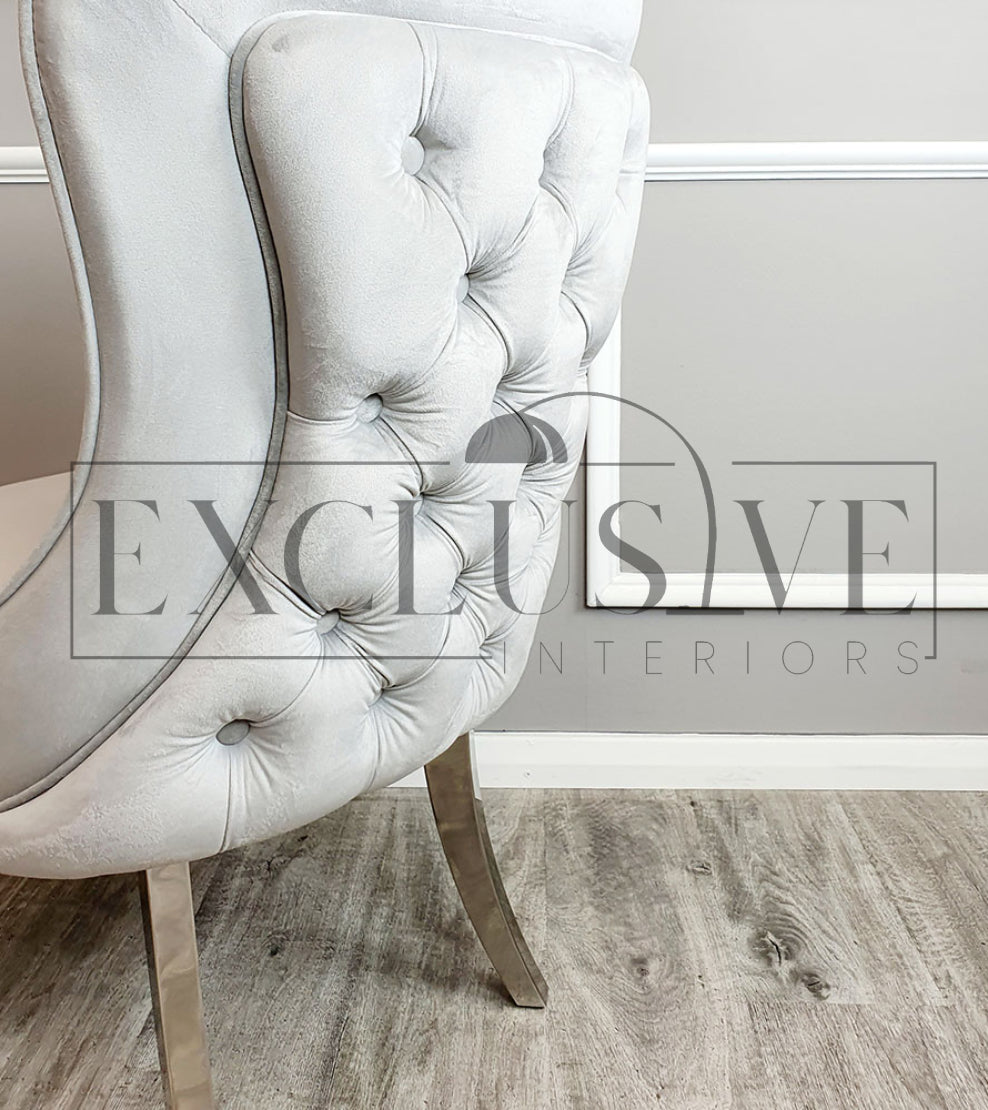 Sandhurst dining chair, deep buttoned back, smooth velvet finish, chrome legs, chic, comfortable chairs, opulent chair style, luxurious easy clean fabrics impressive dining chairs in light cream