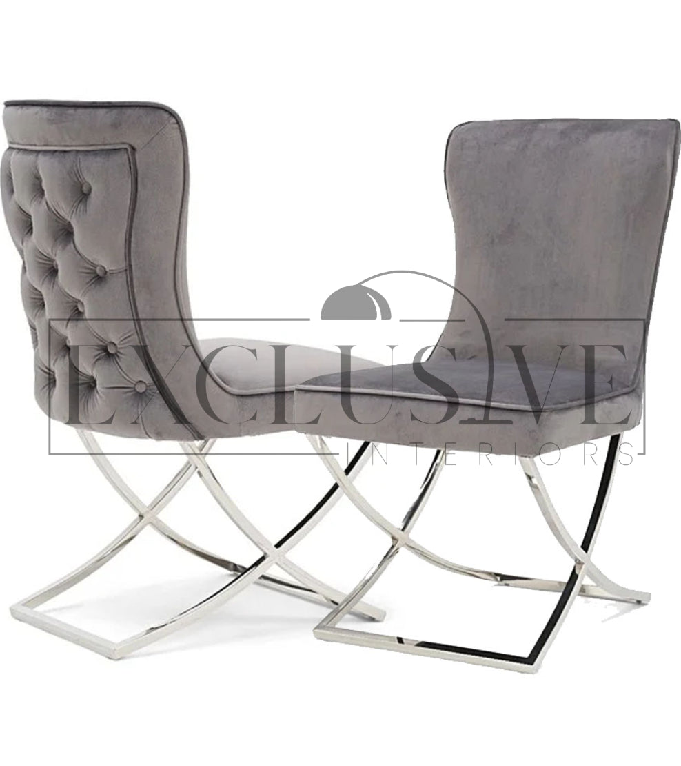 The Sandhurst Crossed Leg Dining Chair, Premium design, chic, comfortable luxury couches, opulent sofa styles, luxurious sofa fabrics, modern luxury design buttoned back, thick cushion, chrome legs in grey fabric