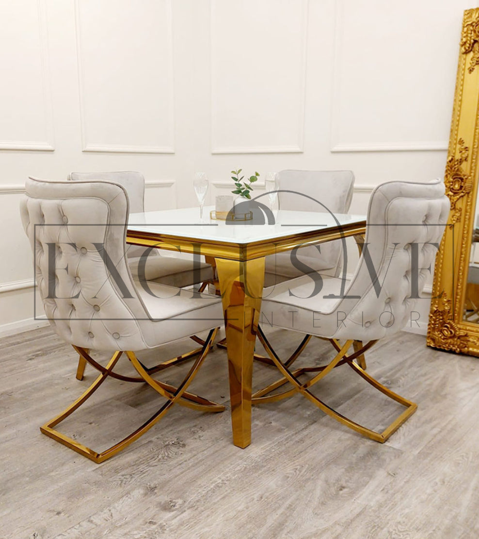 The Sandhurst Crossed Leg Dining Chair, Premium design, chic, comfortable luxury couches, opulent sofa styles, luxurious sofa fabrics, modern luxury design buttoned back, thick cushion, gold legs in cream fabric