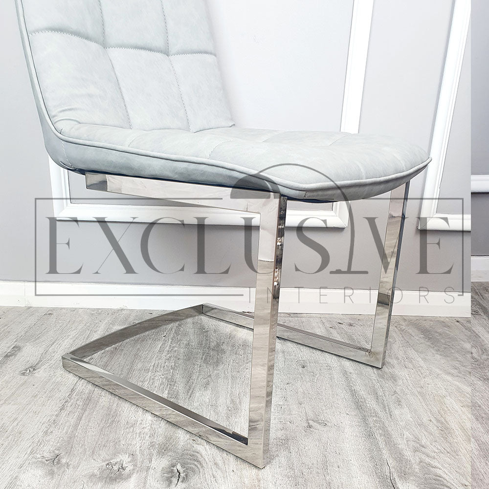 Tara Dining Chairs stylish Contemporary Design. Faux leather finish. Premium design, chic, comfortable luxury couches, opulent sofa living room furnishings light grey