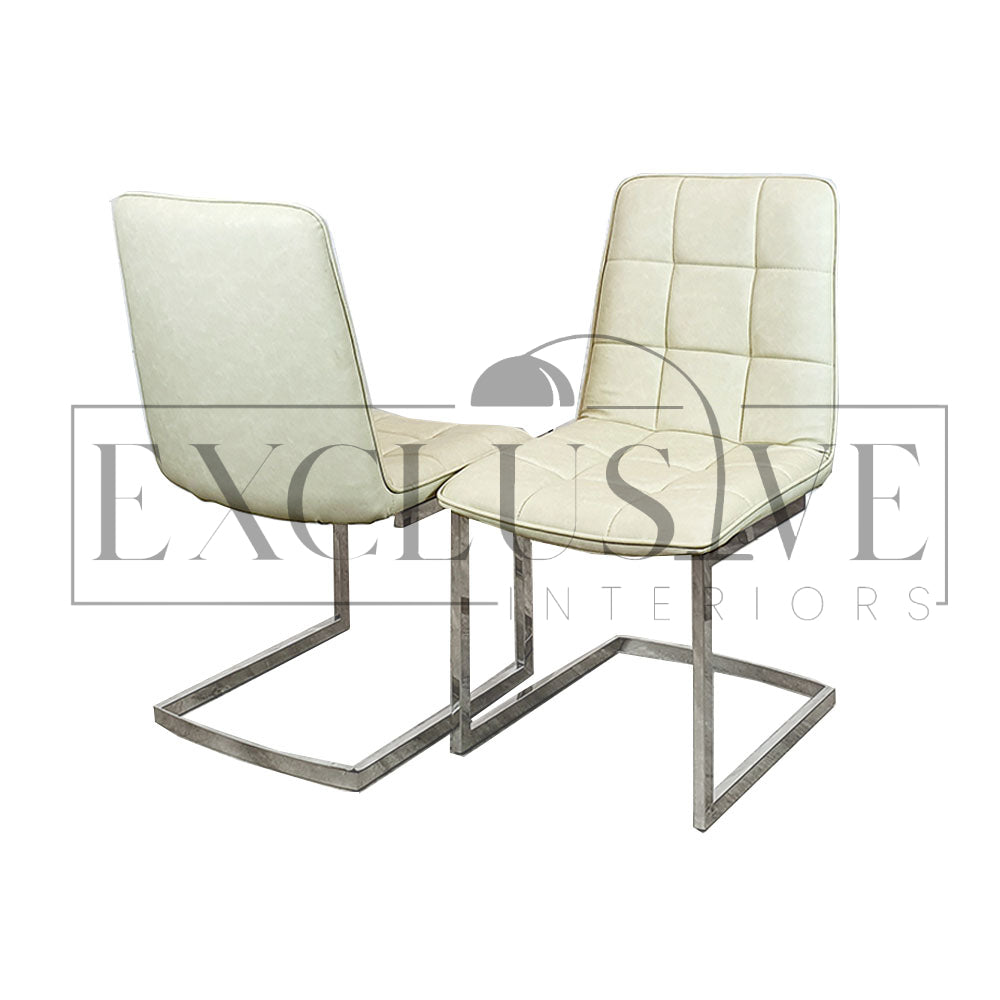 Tara Dining Chairs stylish Contemporary Design. Faux leather finish. Premium design, chic, comfortable luxury couches, opulent sofa living room furnishings cream