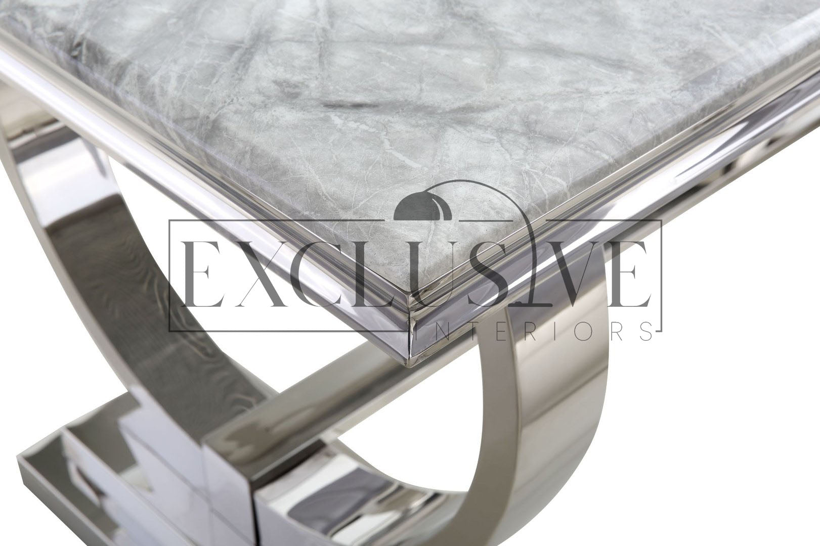 Ultra-chic and high end coffee table, marble or glass top is supported by a polished stainless steel base. white glass, black glasses, grey marble coffee tables living room furnishings, premium design coffee tables, chic coffee table, luxury tables, opulent styles, luxurious style modern design