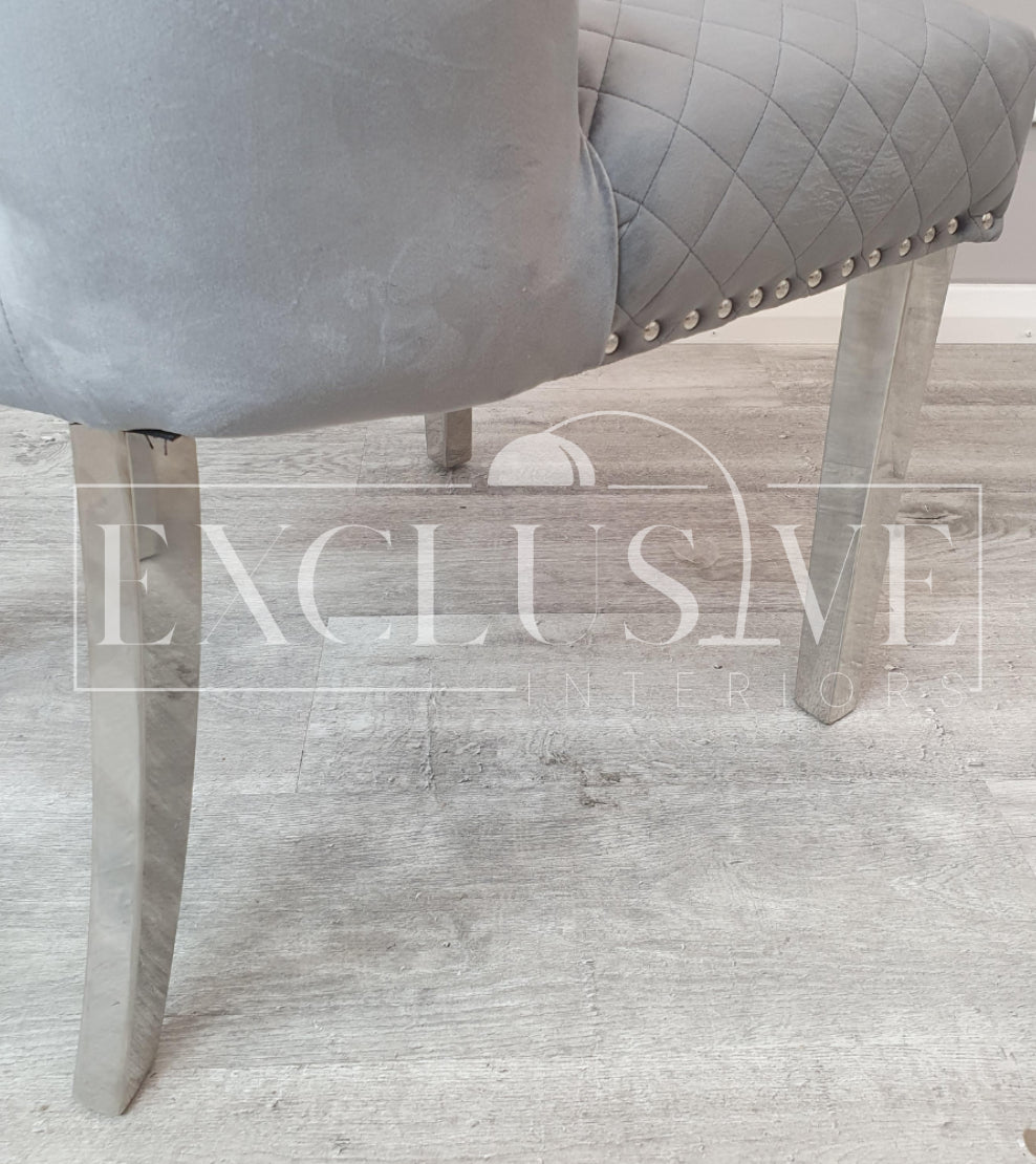 Our Chelsea Dining Chair velvet finish, buttoned back design chrome lion knocker. Luxury dining chairs, premium chairs, chrome dining chair, fancy dining chairs